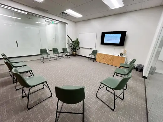 Circular seating arrangement in a therapy room at Care Star Recovery & Wellness, an intensive outpatient program in Galveston.