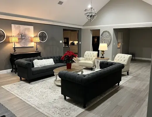 Cozy living room with elegant seating at Legacy House Sober Living, a sober living home in Galveston.