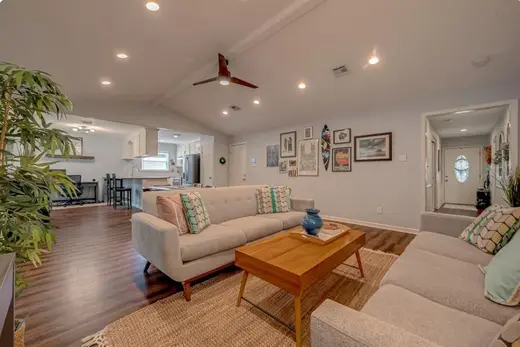 Bright and inviting living room at Eudaimonia Women's Recovery Homes, a sober living home in Galveston.